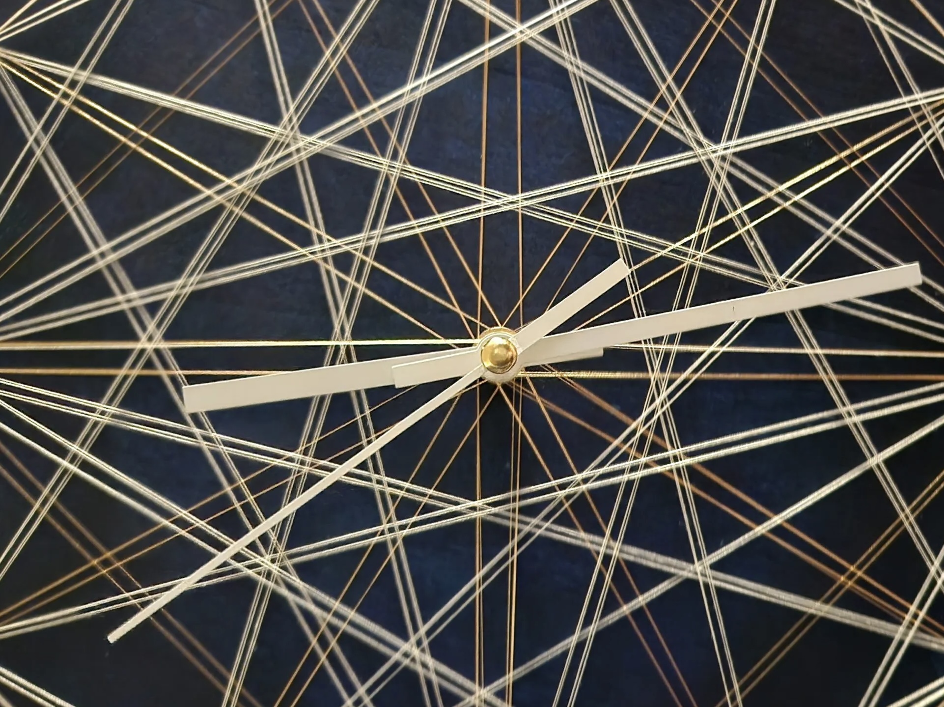 Mixed media string-art clock by Katherine Sallas